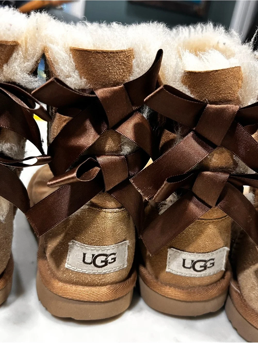 2 pair UGG Chestnut Satin Bow Back Shearling Booties, TWINS, Sz 11, excellent